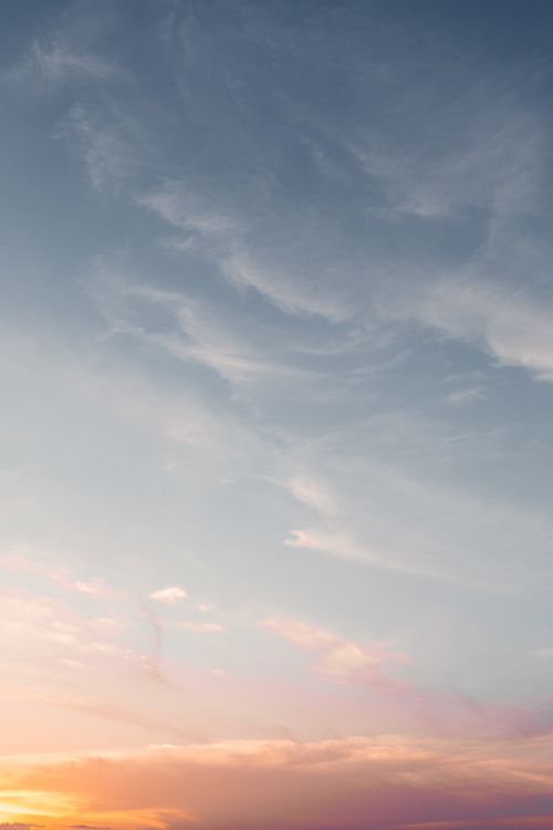 Free Capture the beauty of a Colombian sunset with gentle colors and sweeping cloud formations. Stock Photo
