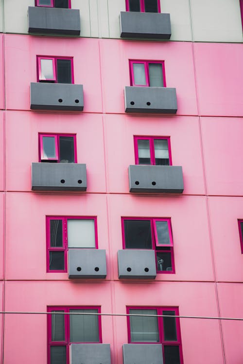 Gratis Foto stok gratis balkon, bangunan, berwarna merah muda Foto Stok