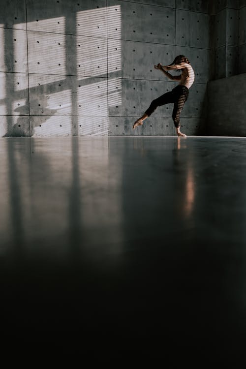 Free A Man Practicing Contemporary Dance Inside the Studio Stock Photo