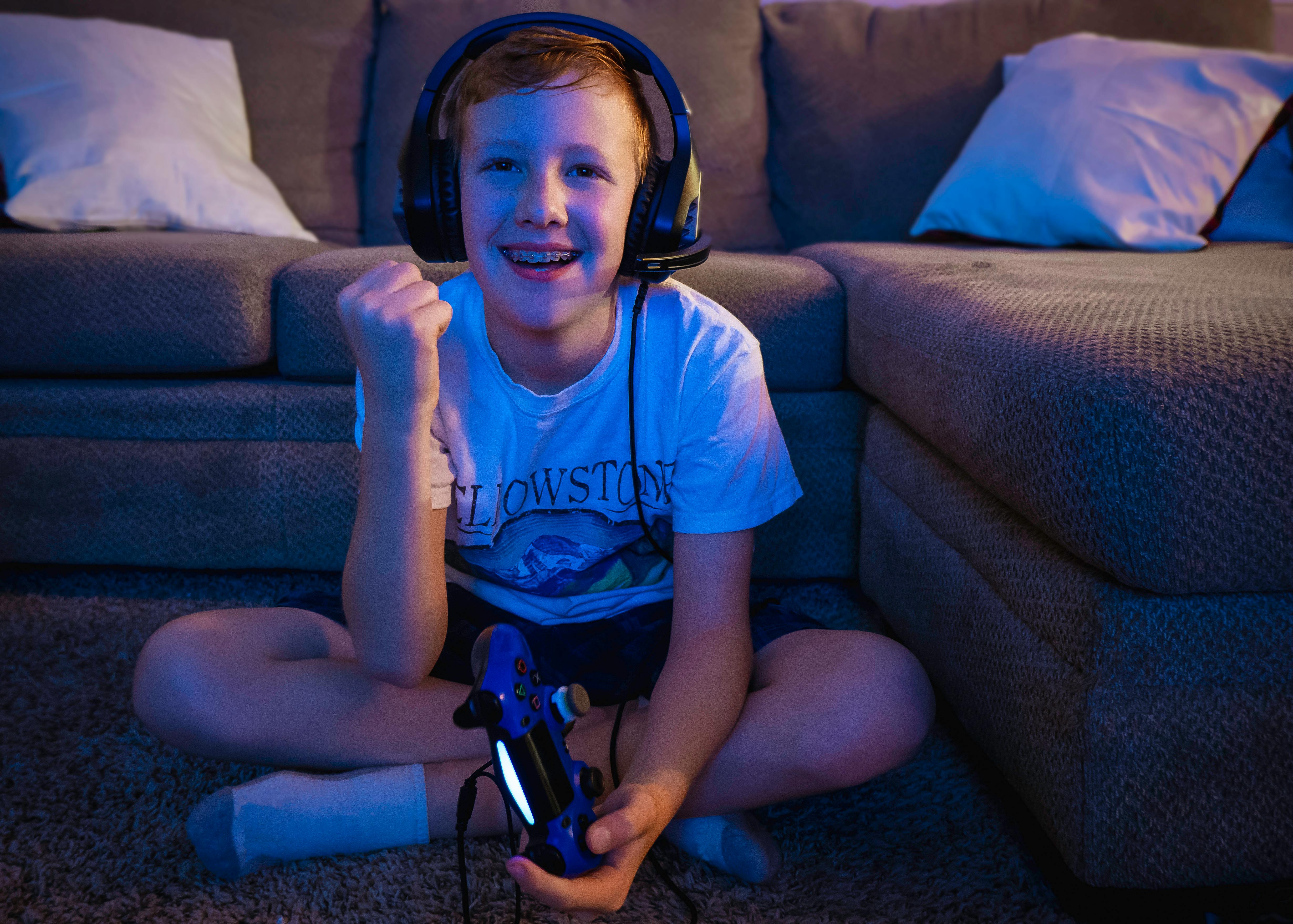 Kids playing video games Stock Photos, Royalty Free Kids playing