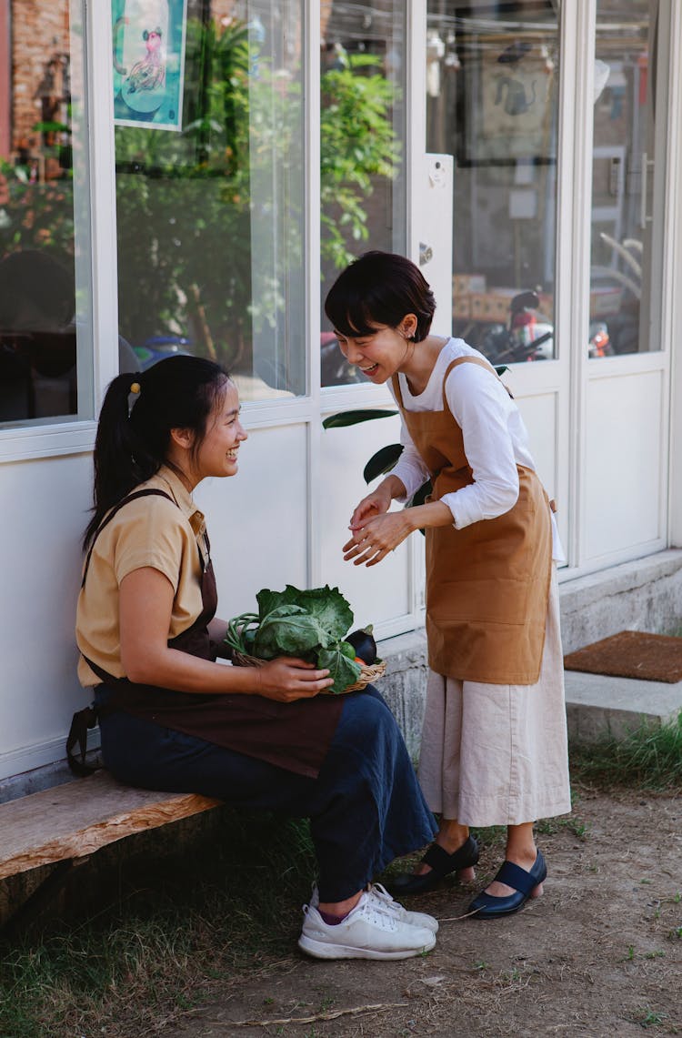 Happy Women Outside A Business Establishment