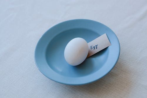 Free Egg in a Blue Bowl Stock Photo