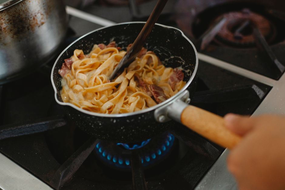 cooking sauce pan stirring