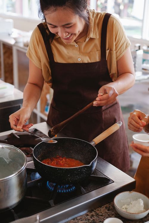 Chef cooking with joy in a modern kitchen