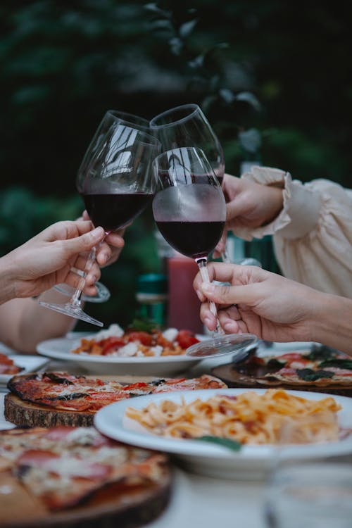 People Toasting Wine Glasses