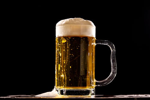 Free Close-Up Shot of a Glass of Beer Stock Photo