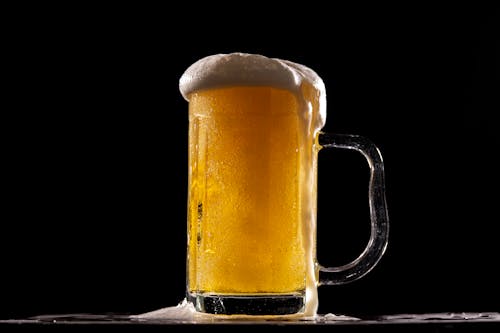 Free Close-Up Shot of a Glass of Beer Stock Photo