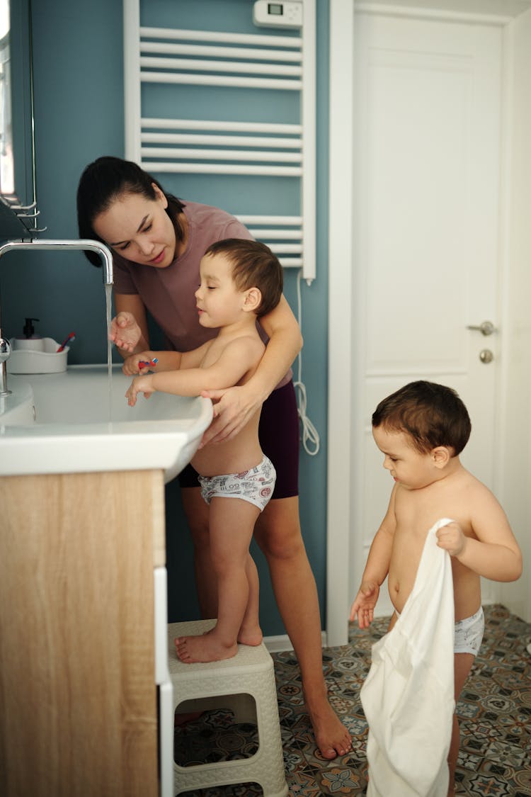 Mother And Sons In Bathroom