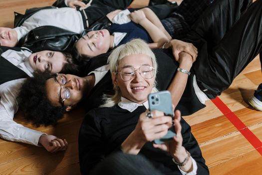 Woman in Black Shirt Holding Iphone