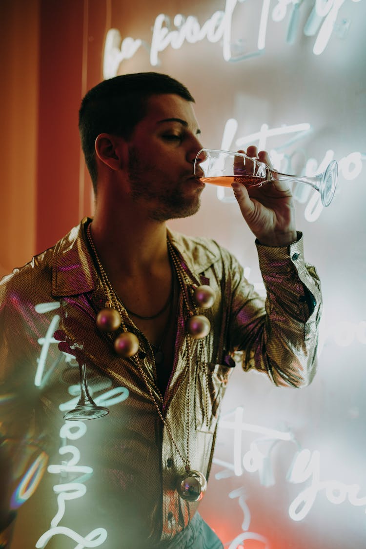 Man Drinking Champagne