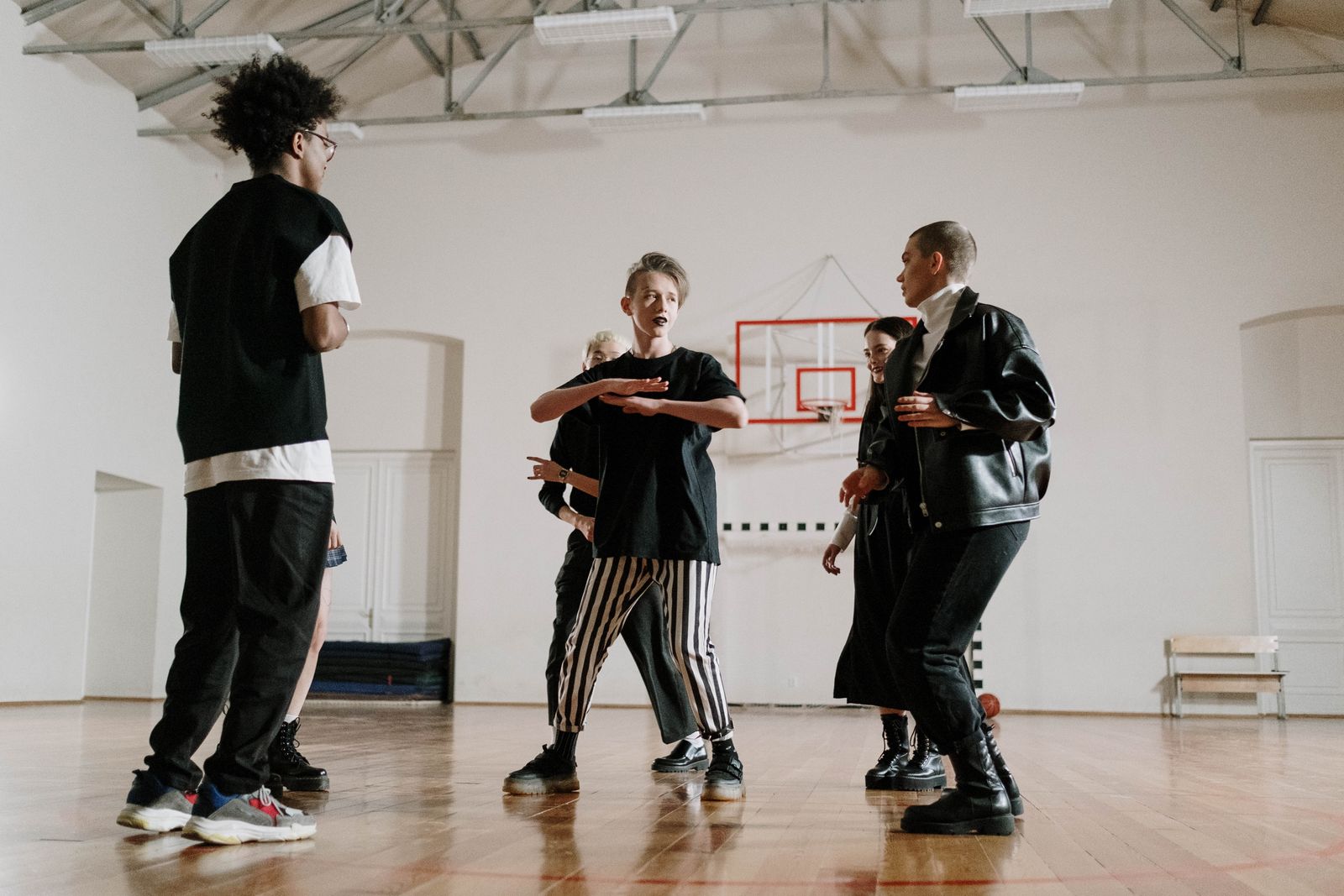 Hip-hop crew performing an energetic routine on stage