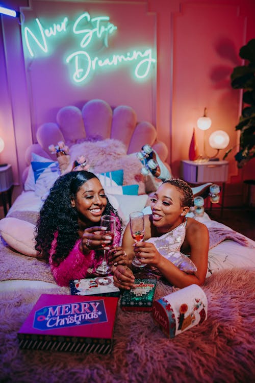 Women Celebrating Christmas in the Bedroom