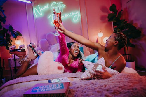 Women Having a Party in Bed