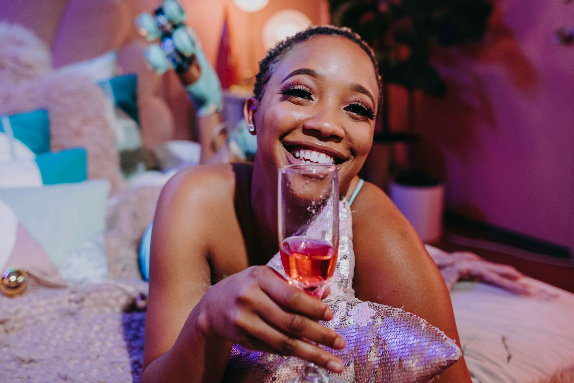 Woman in Blue Tank Top Holding Clear Drinking Glass