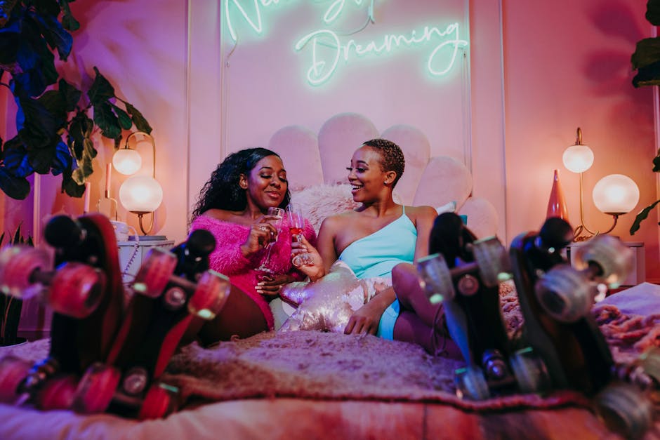 3 Women Sitting on Bed