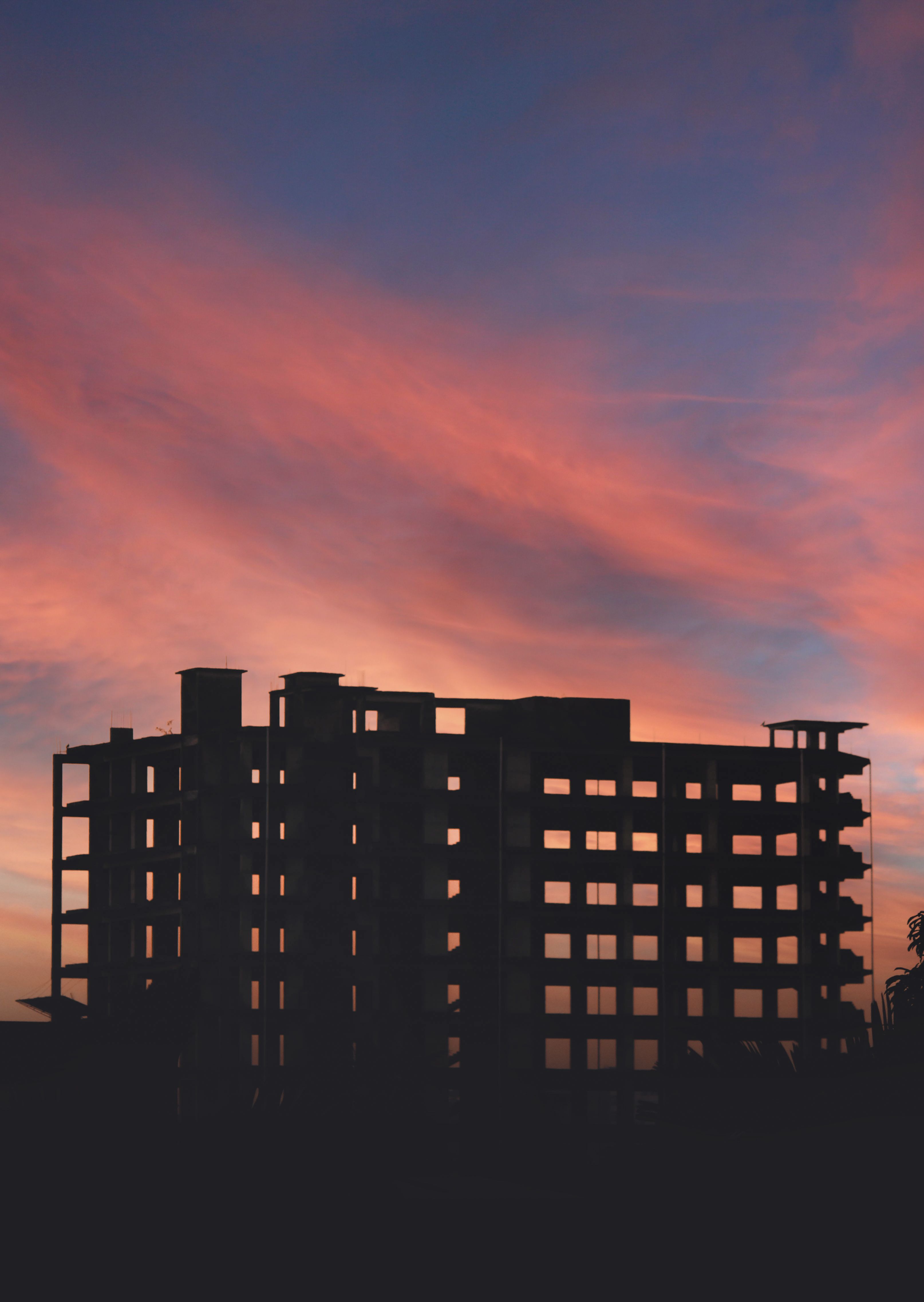 Silhouette of a Building during Sunrise · Free Stock Photo