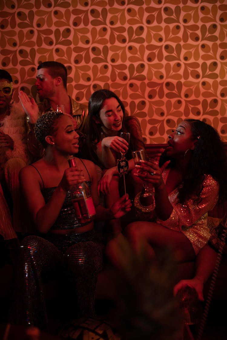 Women Having A Conversation At The Party