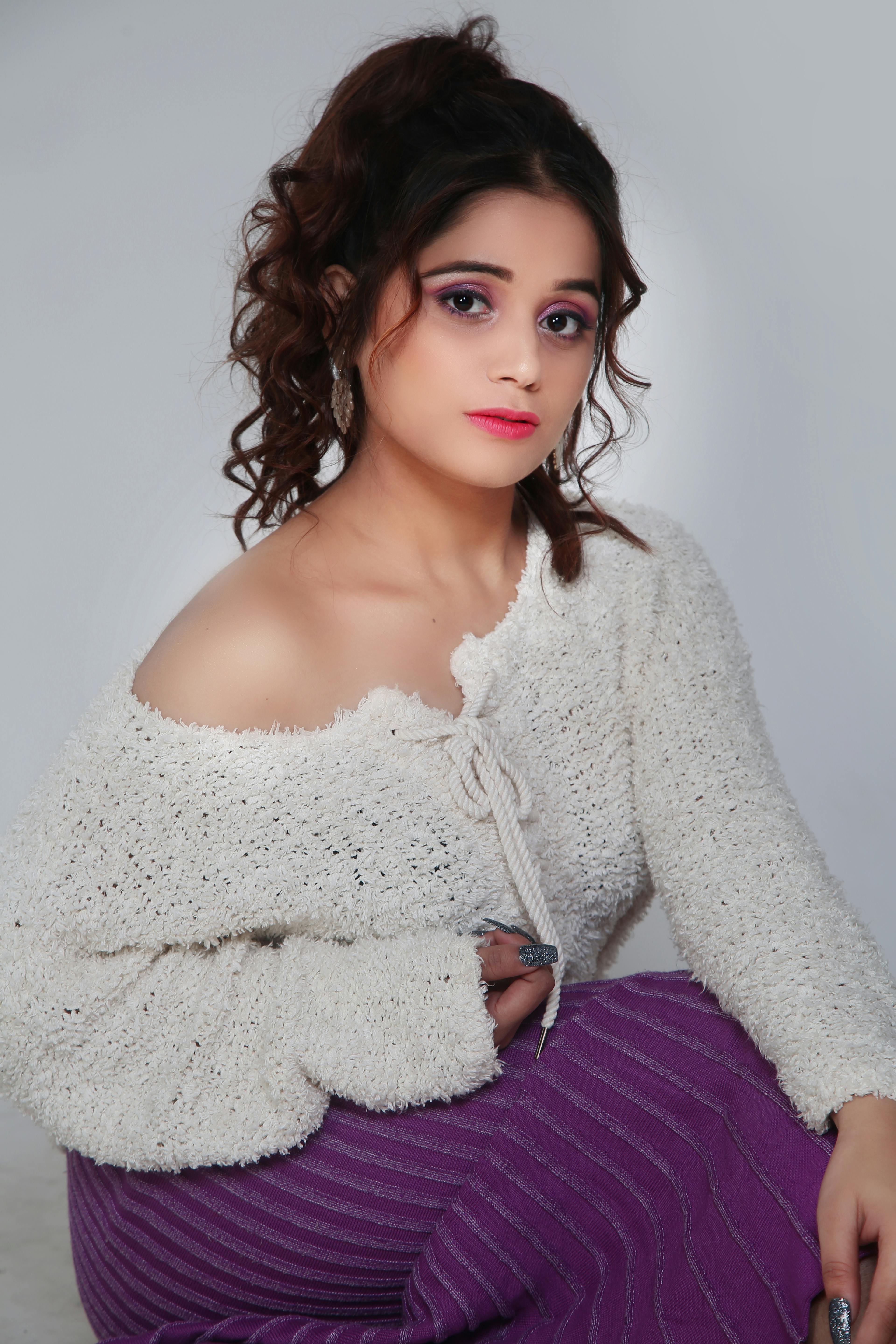 Pleasant lady sitting in studio