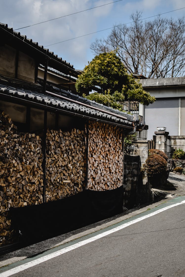 Wood Stacked In Building In Town