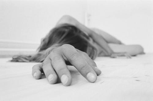 Monochrome Photo of a Person's Hand