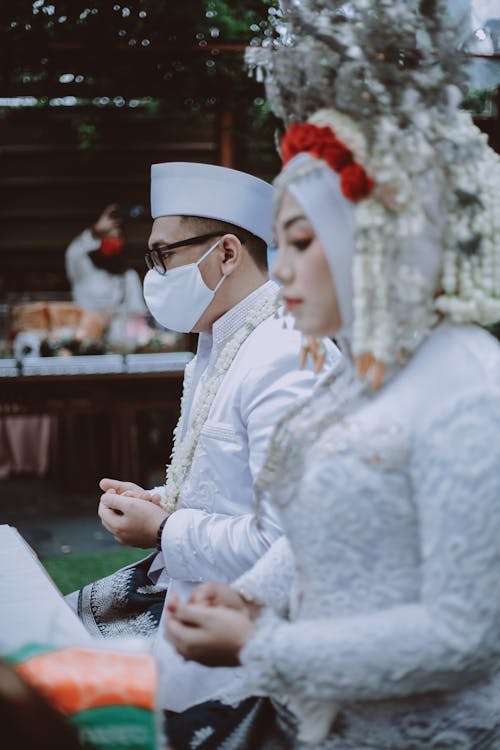 Hijabi Bride and Groom During Wedding Ceremony