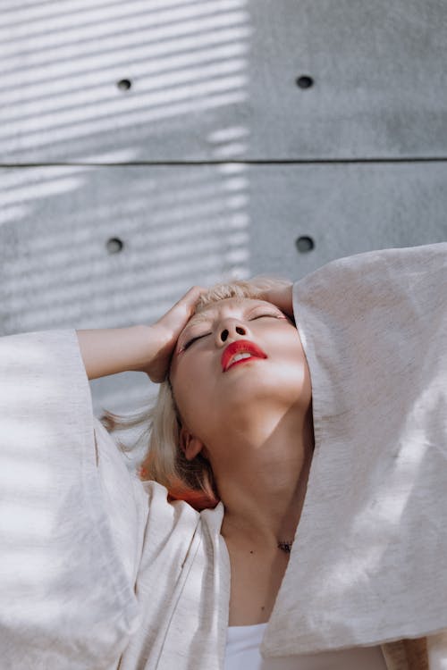 Photo of Woman touching Her Head