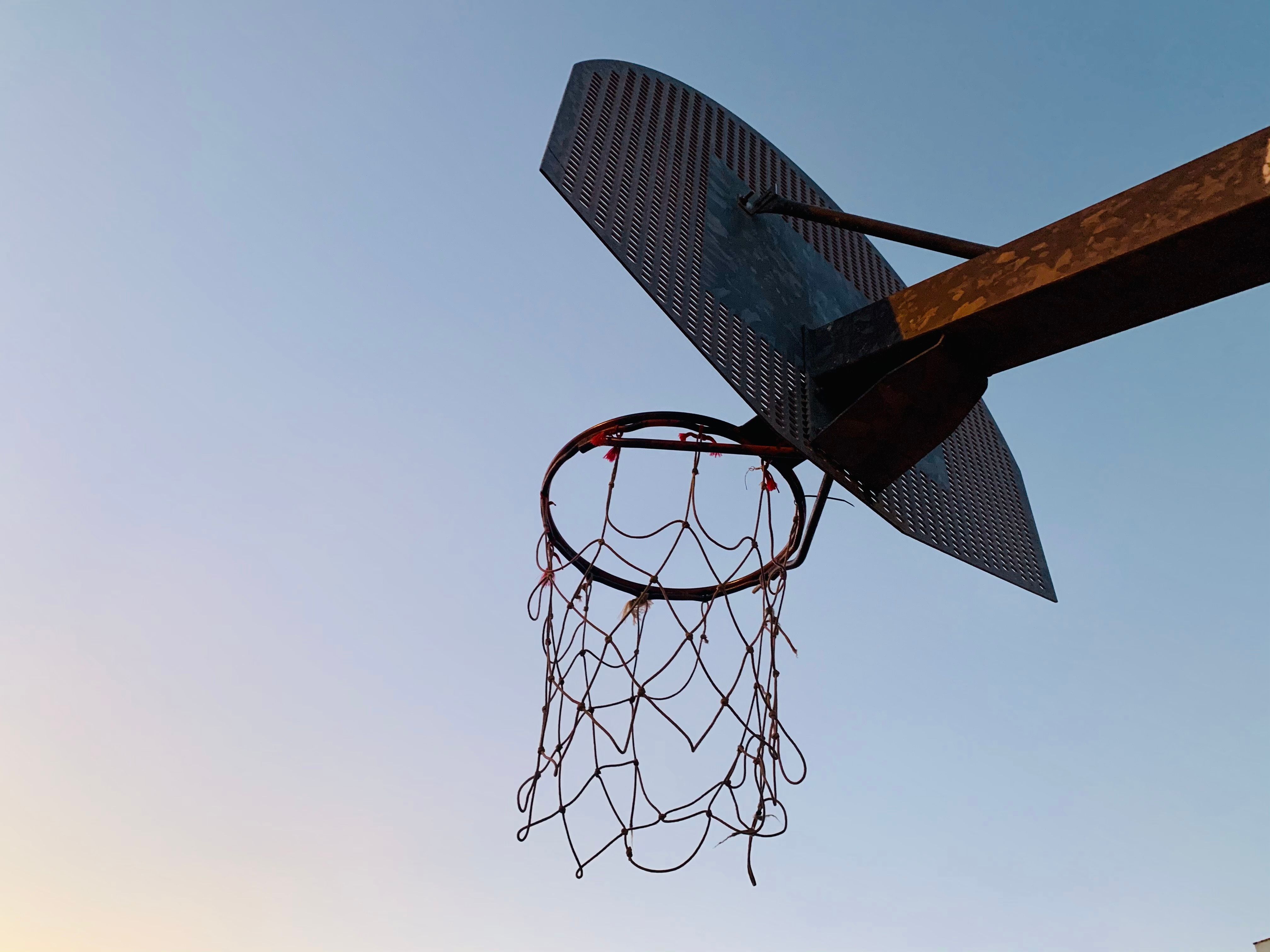 Low-Angle Shot of a Basketball Hoop · Free Stock Photo