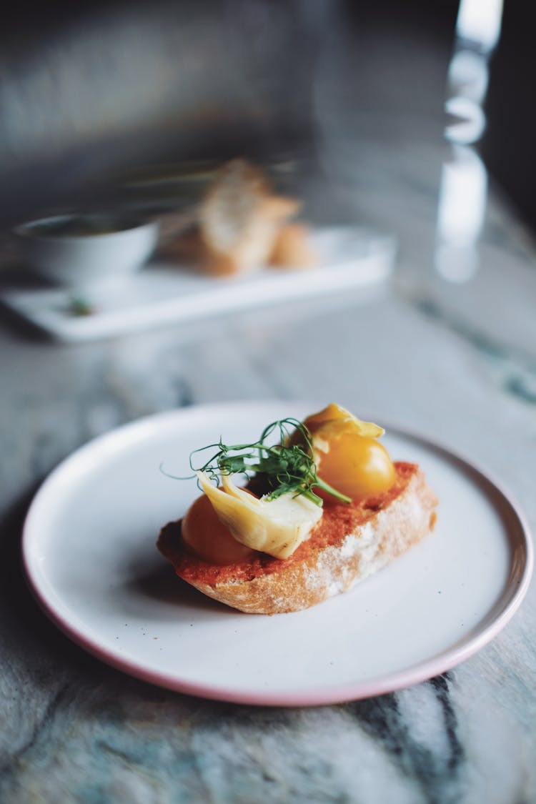 Toast With Fish Served On White Plate