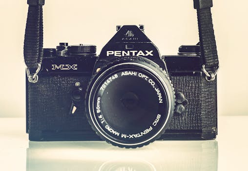 Close-up of a classic Pentax film camera, capturing nostalgic charm and vintage style.