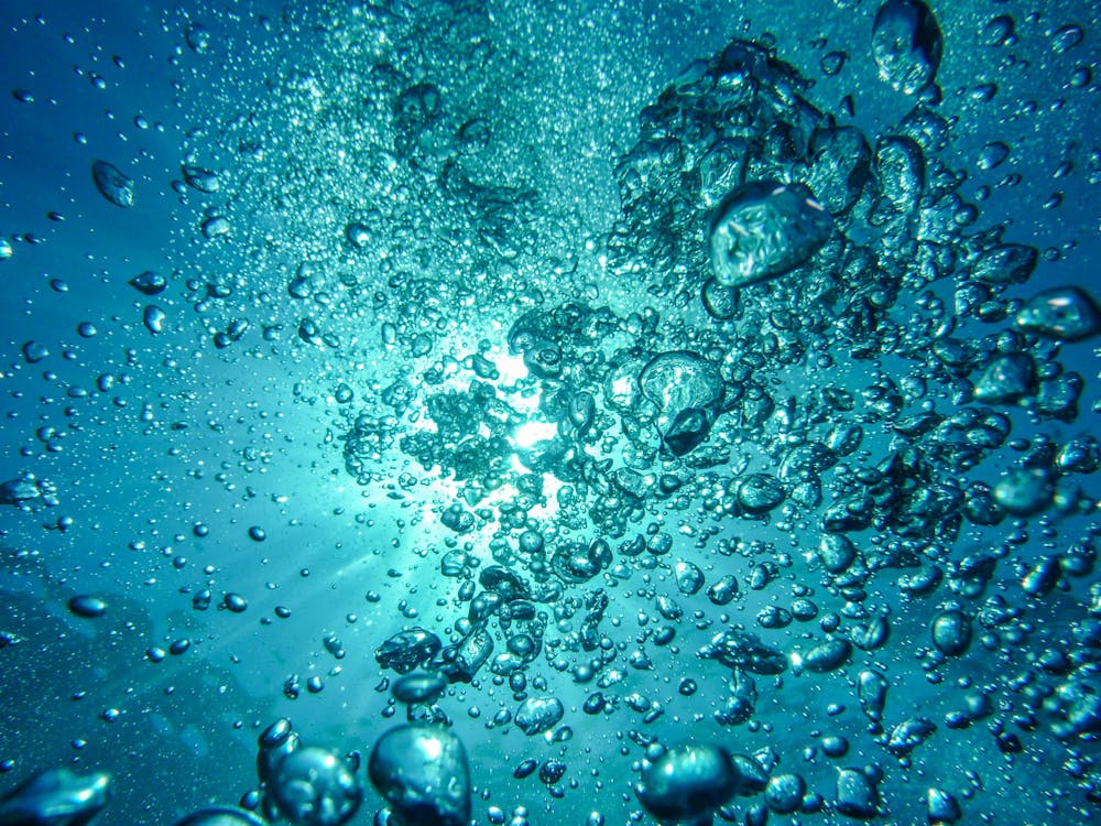 Free Water Bubbles Under the Sea Stock Photo