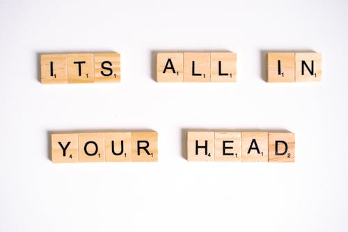 Its All in Your Head Sign out of Scrabble Tiles
