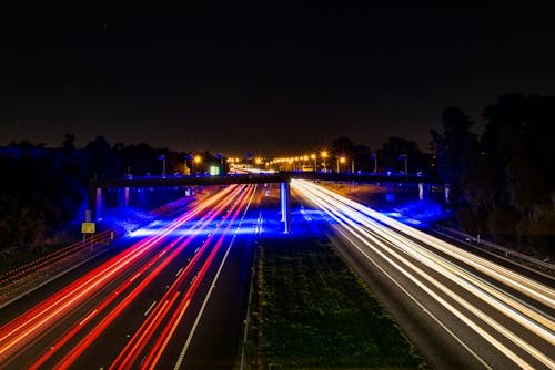 Time Lapse Photography of Cars on Road during Night Time