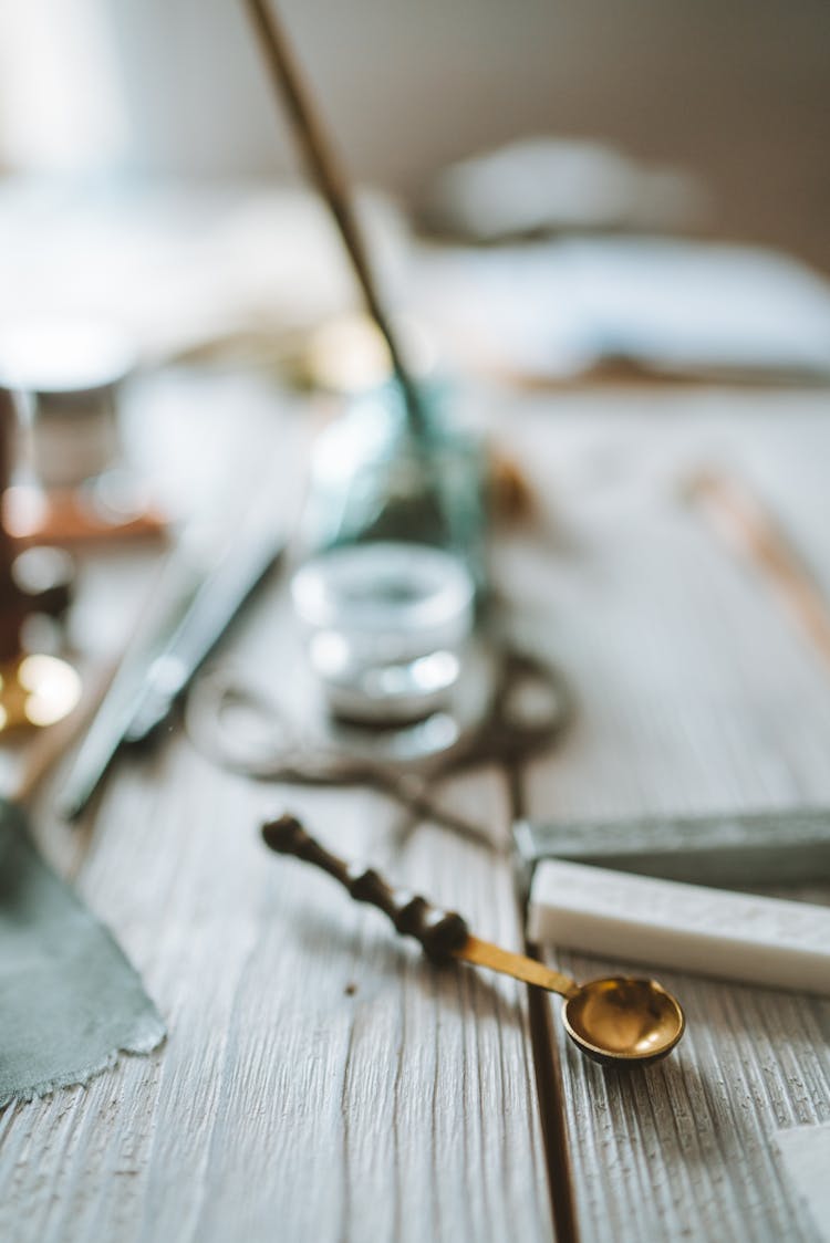 Close-up Of A Vintage Tea Spoon On A Table 