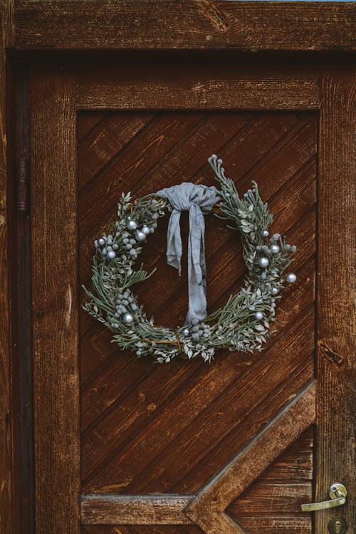 Free A Christmas Wreath Hanging on the Door Stock Photo