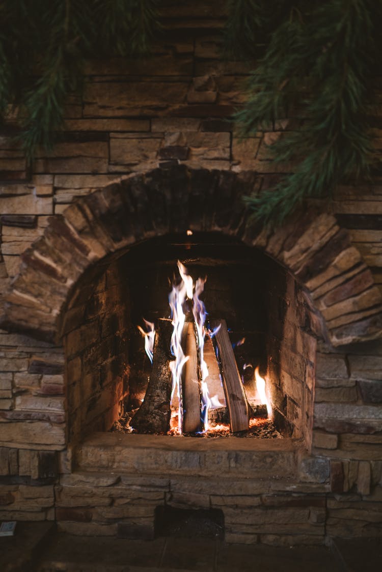 A Close-Up Shot Of A Brick Fireplace