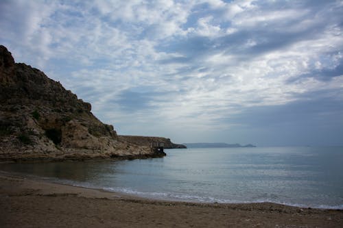 Безкоштовне стокове фото на тему «берег моря, вода, камінь» стокове фото