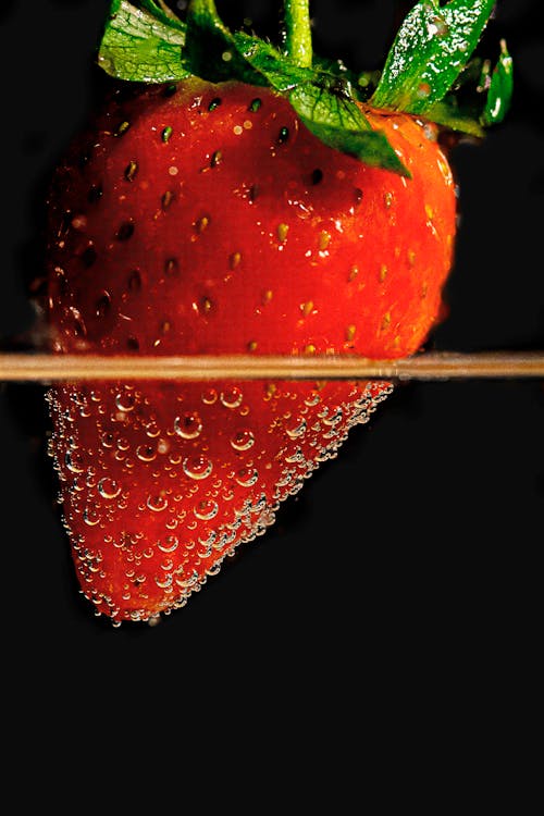 Red Strawberry in Close Up Photography