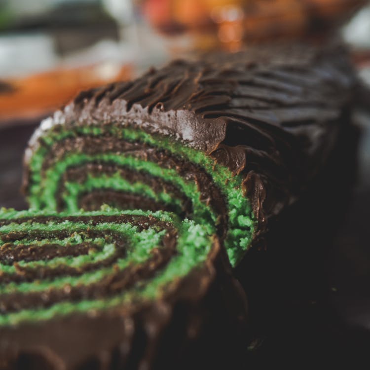 Close-up Shot Of Chocolate Cake With Green Filling