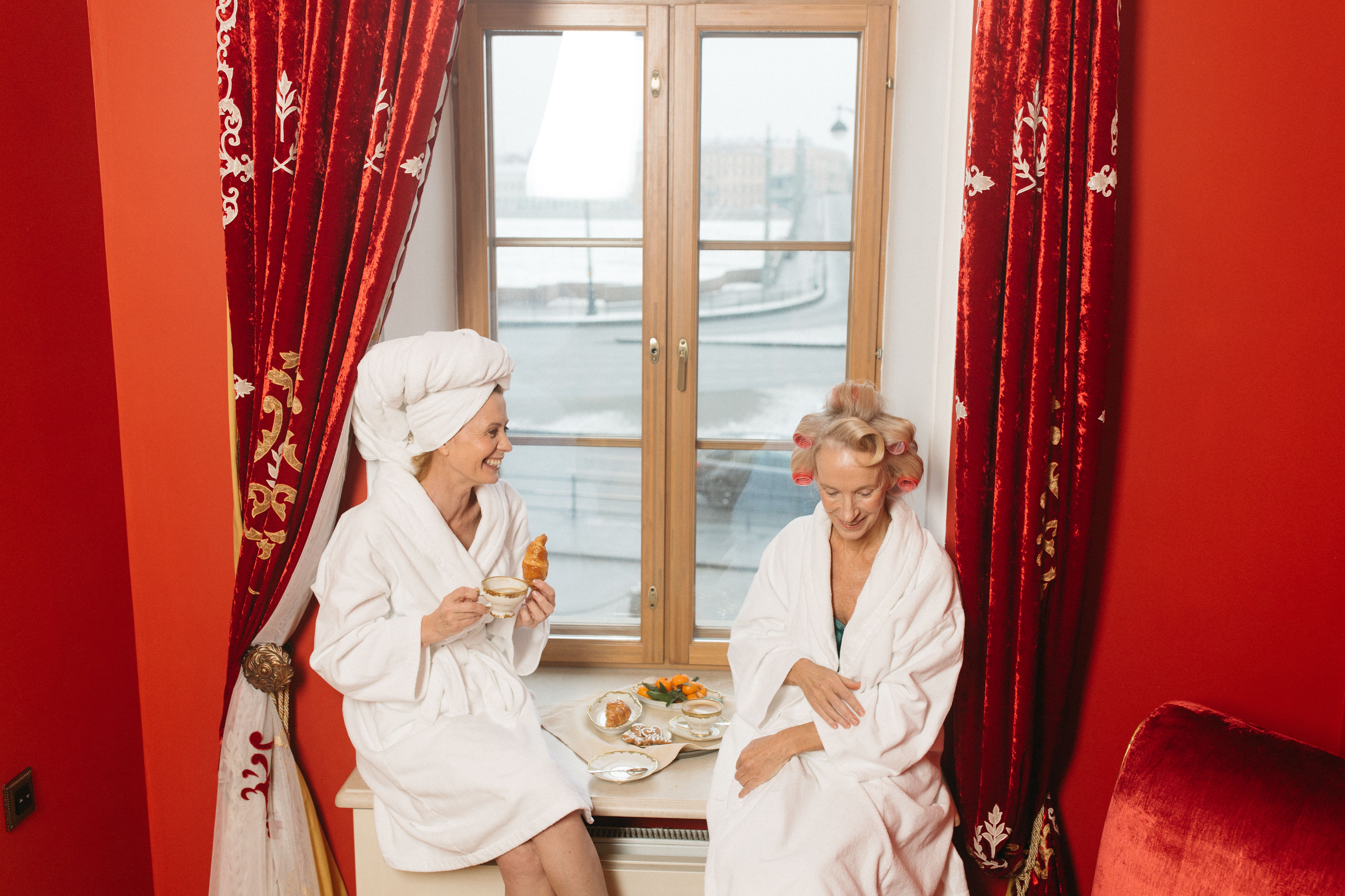 Elegant boutique hotel room in Riga, Latvia, with stylish decor and a comfortable bed.