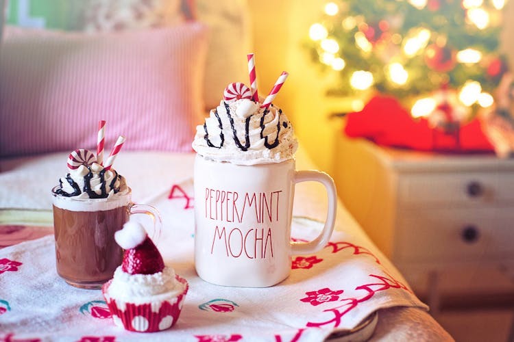 
A Close-Up Shot Of Hot Beverages And A Cupcake