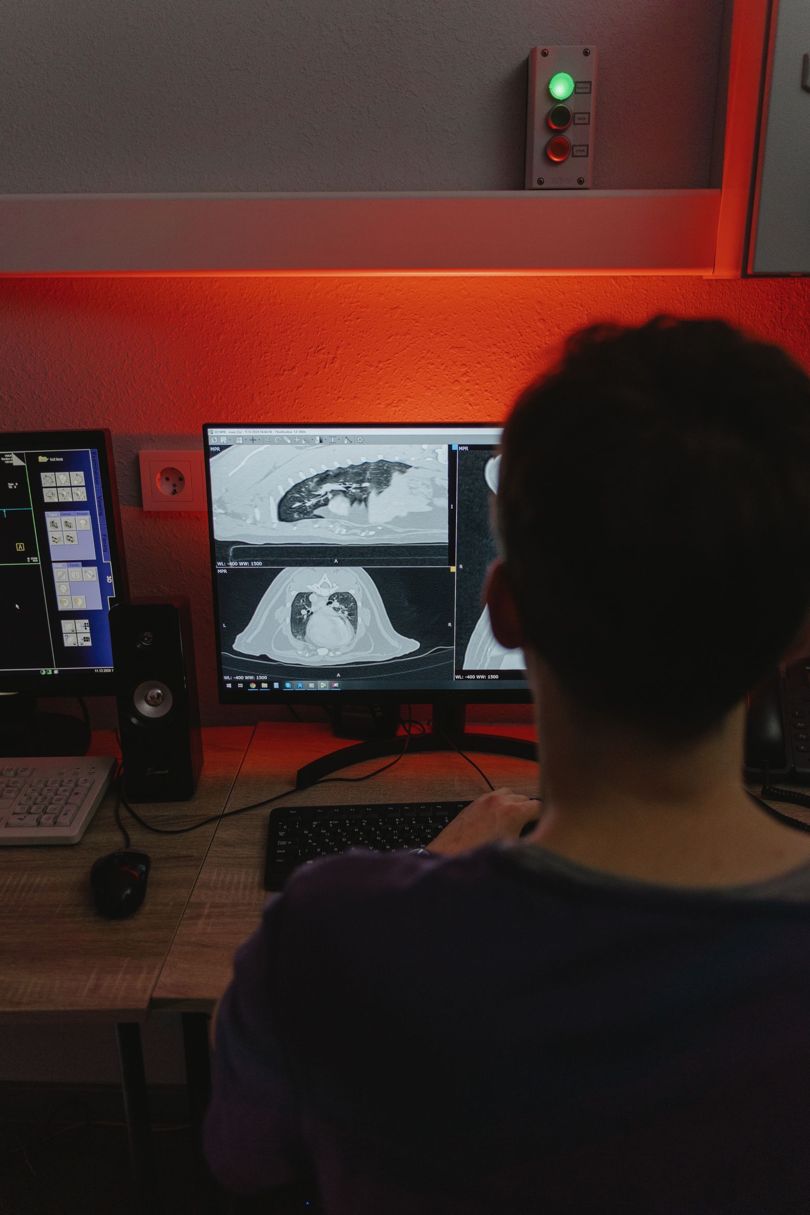Radiologist reviewing imaging data in a clinical environment