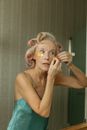 Woman in her Sleepwear doing Skincare