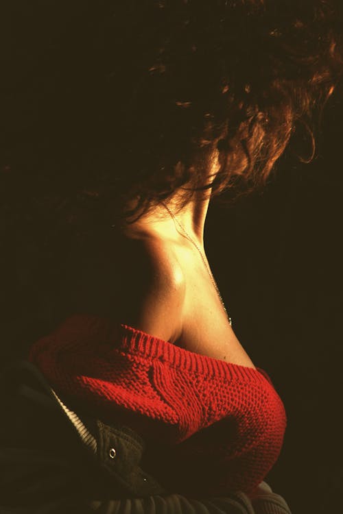 Woman Wearing Red Knitted Off-shoulder Top