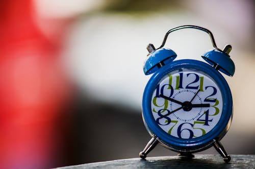 Blue and White Alarm Clock