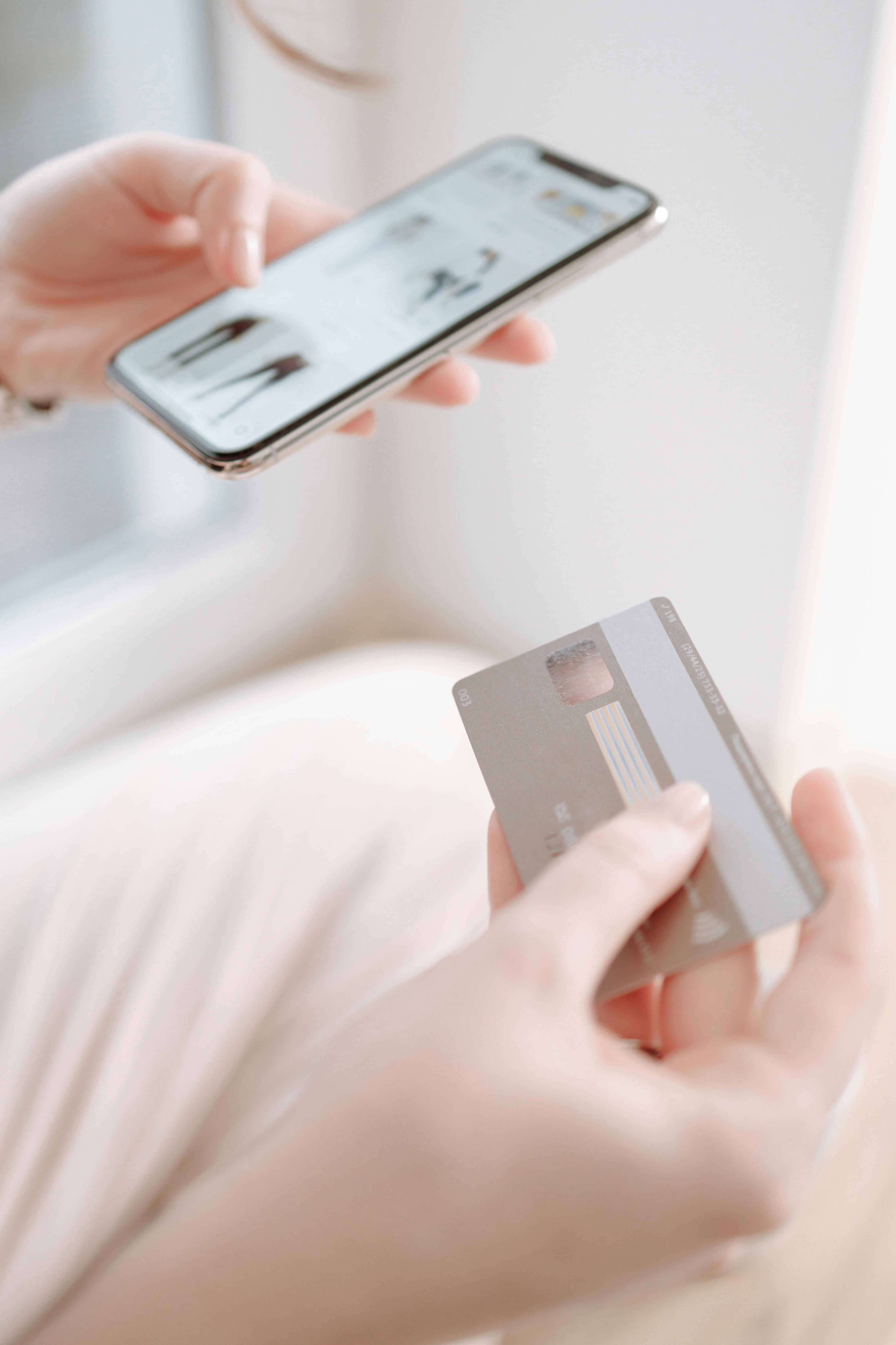 person holding a credit card