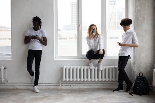 Free Multiethnic students having break in studies Stock Photo