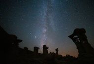 Badlands Under Starry Sky