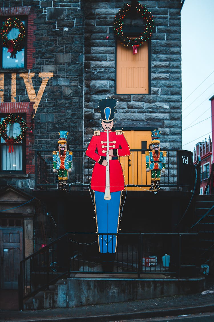 Christmas Decor Of Military Musician Against Building In City