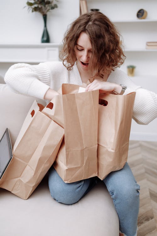 Free Woman with Three Paper Bags Stock Photo