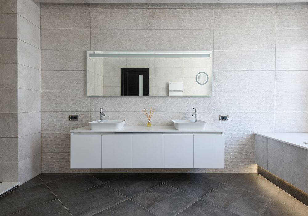 Modern bathroom vanity installation in Downtown Riverside